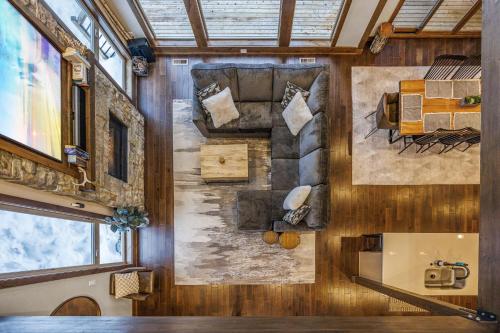 a room with a large painting on the wall at Three Pines in Cle Elum