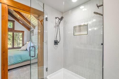 a bathroom with a shower with a glass door at Suncadia Craftsman in Cle Elum
