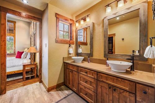 a bathroom with two sinks and a bedroom at Tin Cup in Cle Elum