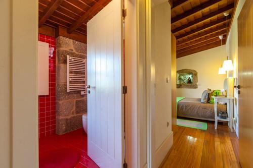 Ένα ή περισσότερα κρεβάτια σε δωμάτιο στο Quinta do Olival