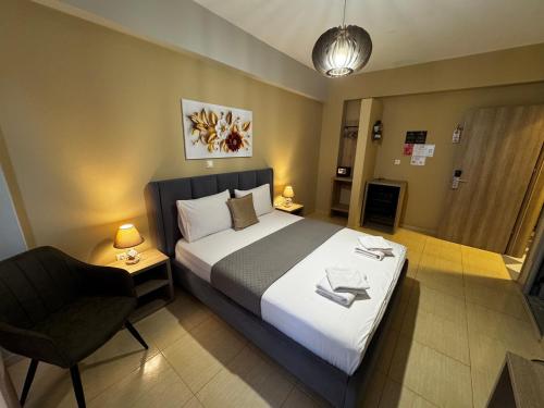 Llit o llits en una habitació de Hotel Driloni