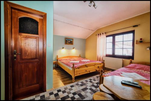 Ένα ή περισσότερα κρεβάτια σε δωμάτιο στο Apartmán Tilia