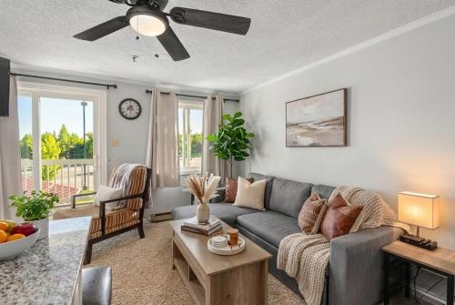 a living room with a couch and a table at Snowshoe Ski-InSki-Out Steps to Ballhooter Lift Mountain Lodge Condo in Snowshoe