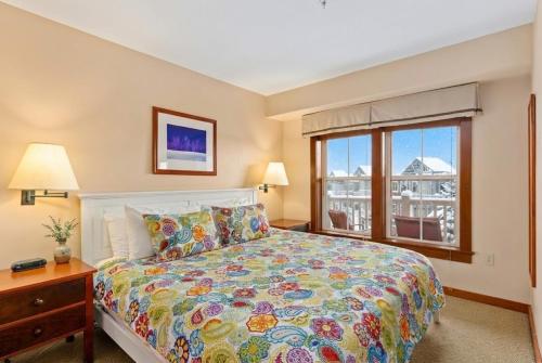 a bedroom with a large bed and a window at AS 326 No Resort Fee Pool-View Ski-InOut in Snowshoe