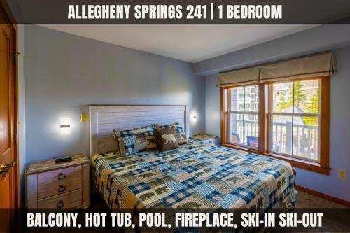 a bedroom with a bed and a window at Lux Stay USA Pool view Crest Ski-inout Hot Tub AS241 in Snowshoe