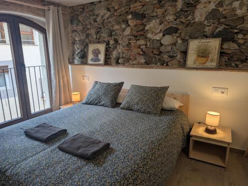 Llit o llits en una habitació de Ca la Ru