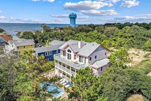 an aerial view of a house with a water tower at 3947 - Leg-O Duck in Duck