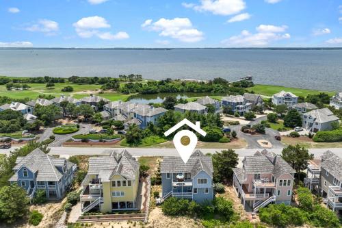 an aerial view of homes with a map of the house at 5592 - Windjammer in Nags Head