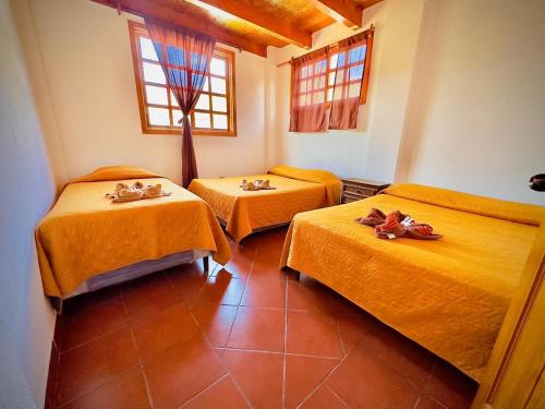 Krevet ili kreveti u jedinici u okviru objekta Hostal Dulces Sueños