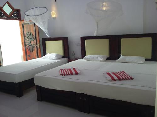 Postel nebo postele na pokoji v ubytování Peacock Reach Hotel