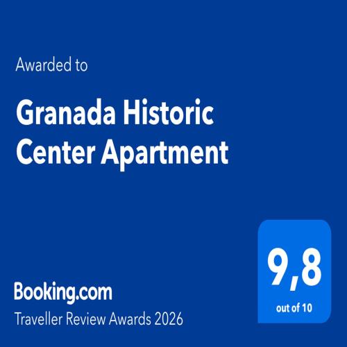 a blue sign with the words grandada historic center apartment at Granada Historic Center Apartment in Granada