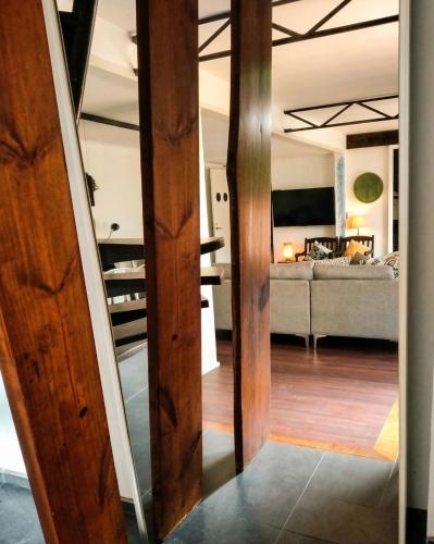 a view of a living room with a couch at Tiny Black Loft in Port Vila