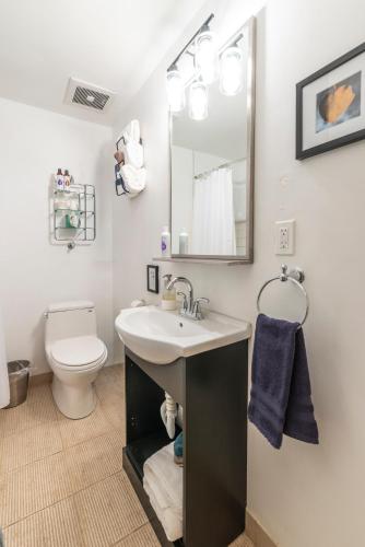 a bathroom with a sink and a toilet at Pikes Peak Paradise Bed and Breakfast in Woodland Park