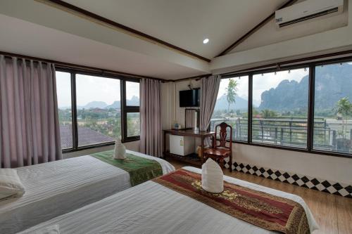 Llit o llits en una habitació de SD View Hotel