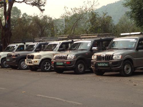 a row of jeepneys parked in a row at New Pokhara Lodge - Pokhara Lakeside in Pokhara
