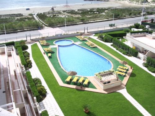 an overhead view of a swimming pool in a resort at Apartment Martinez Cala Josep in Alcossebre