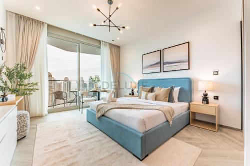 High-Floor Studio Featuring Canal and Burj Khalifa Views, with Easy Access to Downtown, Peninsula Three, Business Bay by Deluxe Holiday Homes