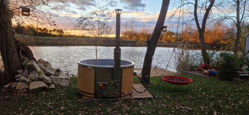 Cosy Waterfront Cabin with Hot Tub