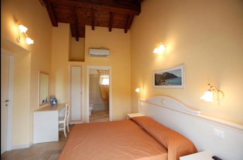 Postel nebo postele na pokoji v ubytování B&B Terra Di Liguria