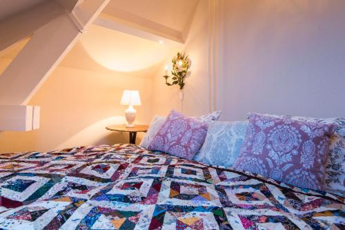 Katil atau katil-katil dalam bilik di B&B De Schiedamse Suites