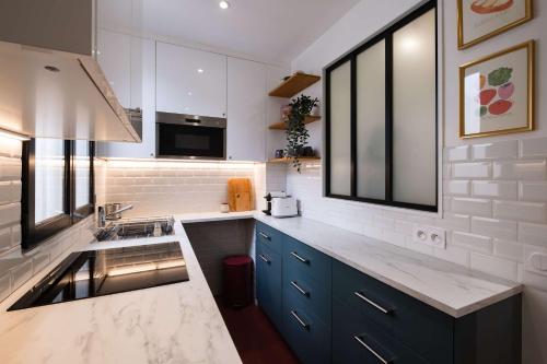 Top Floor Parisian Gem Views & Balcony
