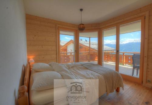 Ancolie 6 a Anzere pres du centre avec vue sur les Alpes