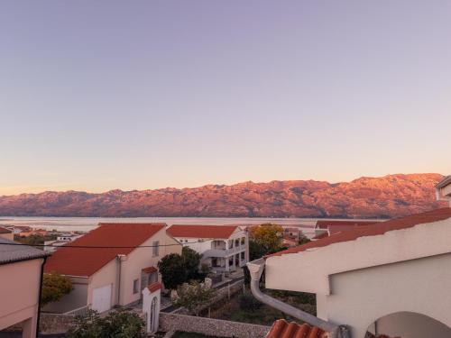 a view of a town with trees and a body of water at Haus Ljubica Ražanac in Ražanac