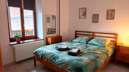 Llit o llits en una habitació de Chez Aurel & Manu