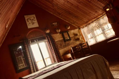 a room with a window in a house with at Le Karthala in Antananarivo