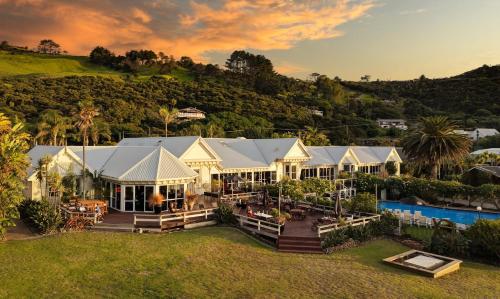 an aerial view of a house with a pool at The Sands Hotel Hokianga in Opononi