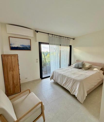 Llit o llits en una habitació de Cap Nioulargo