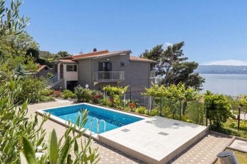 Family friendly house with a swimming pool Omis - 25197