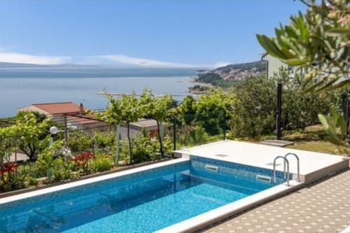 Family friendly house with a swimming pool Omis - 25197