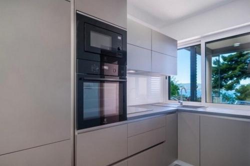 Family friendly house with a swimming pool Omis - 25197