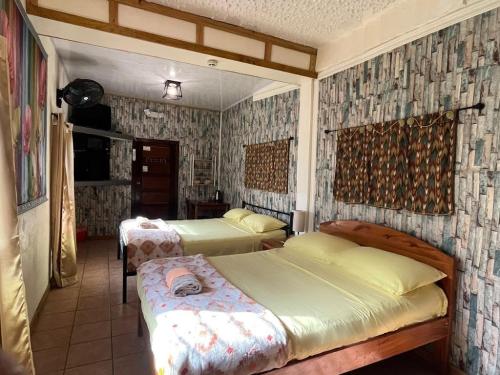 Krevet ili kreveti u jedinici u objektu Maxroomz
