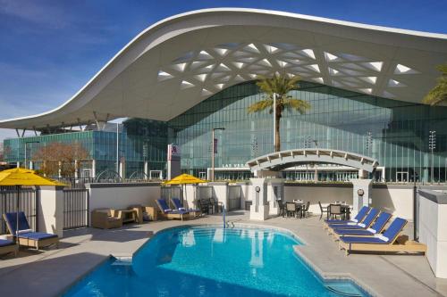 a large building with a swimming pool in front of a building at Las Vegas Marriott in Las Vegas