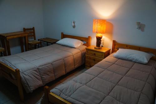 Postel nebo postele na pokoji v ubytování Elatos