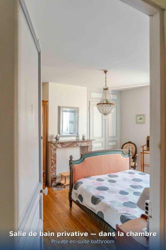 Llit o llits en una habitació de Chez Marie