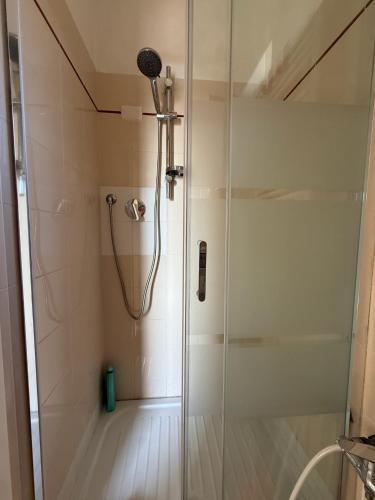 a shower with a glass door in a bathroom at Il Filo di Arianna 2 in Polverara