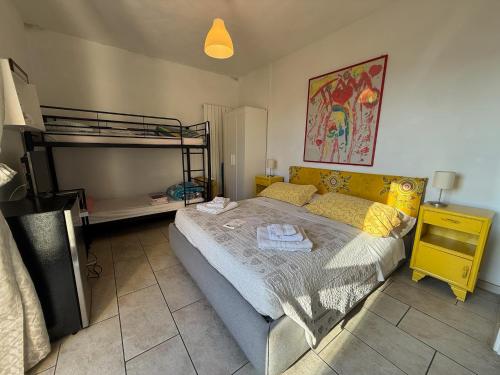 a bedroom with a bed and a bunk bed at Il Filo di Arianna 2 in Polverara