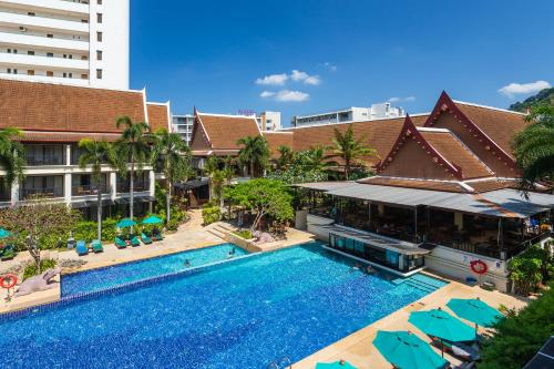 an overhead view of a swimming pool at a resort at Deevana Patong Resort & Spa in Patong Beach