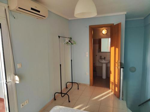 a bathroom with a shower and a sink at First line houses in Sozopoli