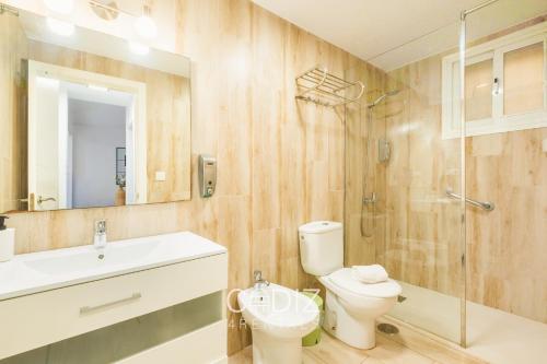 a bathroom with a toilet and a sink and a shower at Hospederia IMAR by Cadiz4Rentals in Cádiz