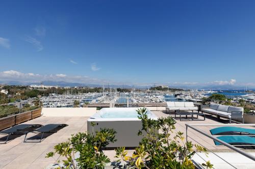 ROOFTOP -Vue port, 4 pers, climatisé, terrasse, jaccuzi, parking