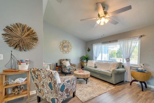 a living room with a couch and a ceiling fan at Beautiful Vacation Spot! in Beverly Hills