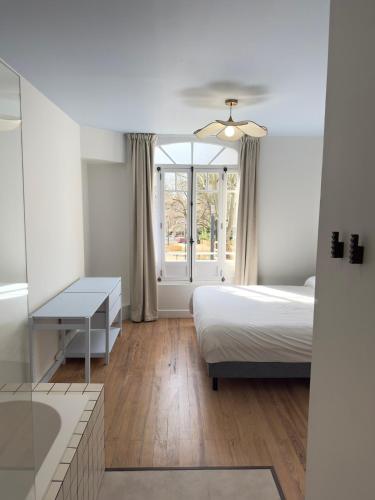 Design & climatisation T3 Vue Parc Lit 180