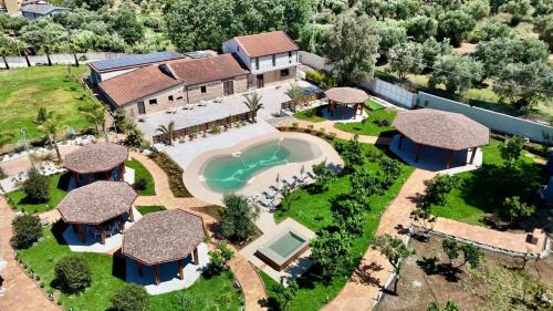 an aerial view of a house with a swimming pool at Il Casale della Baronessa in Palmi