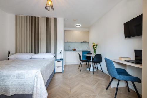 Katil atau katil-katil dalam bilik di Apartments Sentic