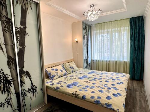 Llit o llits en una habitació de Fine Apartment