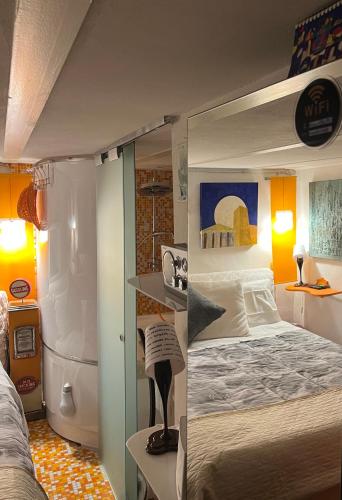 a bedroom with a bunk bed in a room at Grand Tour Suite Home in Spoleto